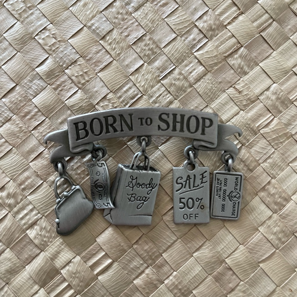 “Born to shop” brooch by JJ